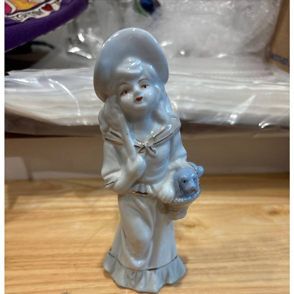 Vintage Porcelain Girl Figurine with Blue Puppy in Basket Gold Gilt Accents